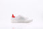photo de baskets CIAO en cuir blanc avec étoile argentée et talon rouge
vue latérale des baskets CIAO blanches en cuir avec clous argentés
zoom sur l’étoile argentée et les détails cloutés des baskets CIAO
femme portant les baskets en cuir CIAO blanches avec un look urbain
détail du talon rouge des baskets CIAO en cuir blanc